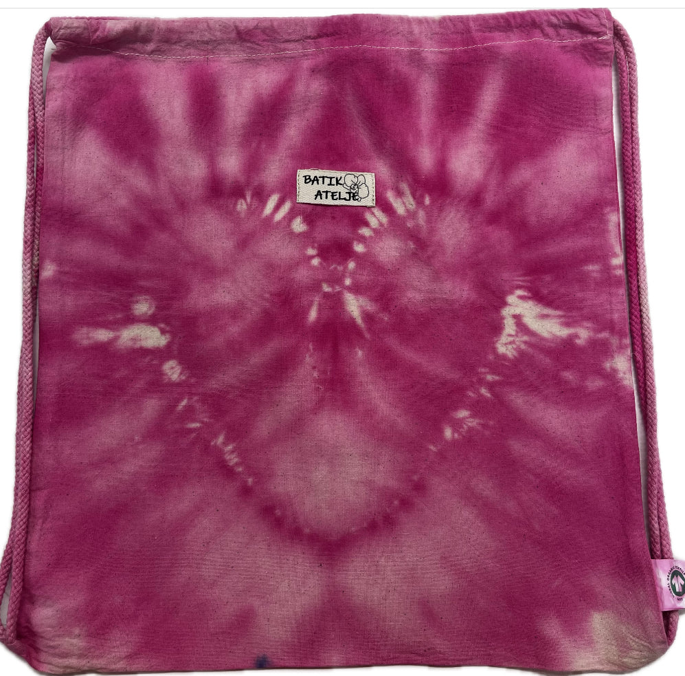 Kaunis ja kestävä fuksian punainenbatiikkikangapussi