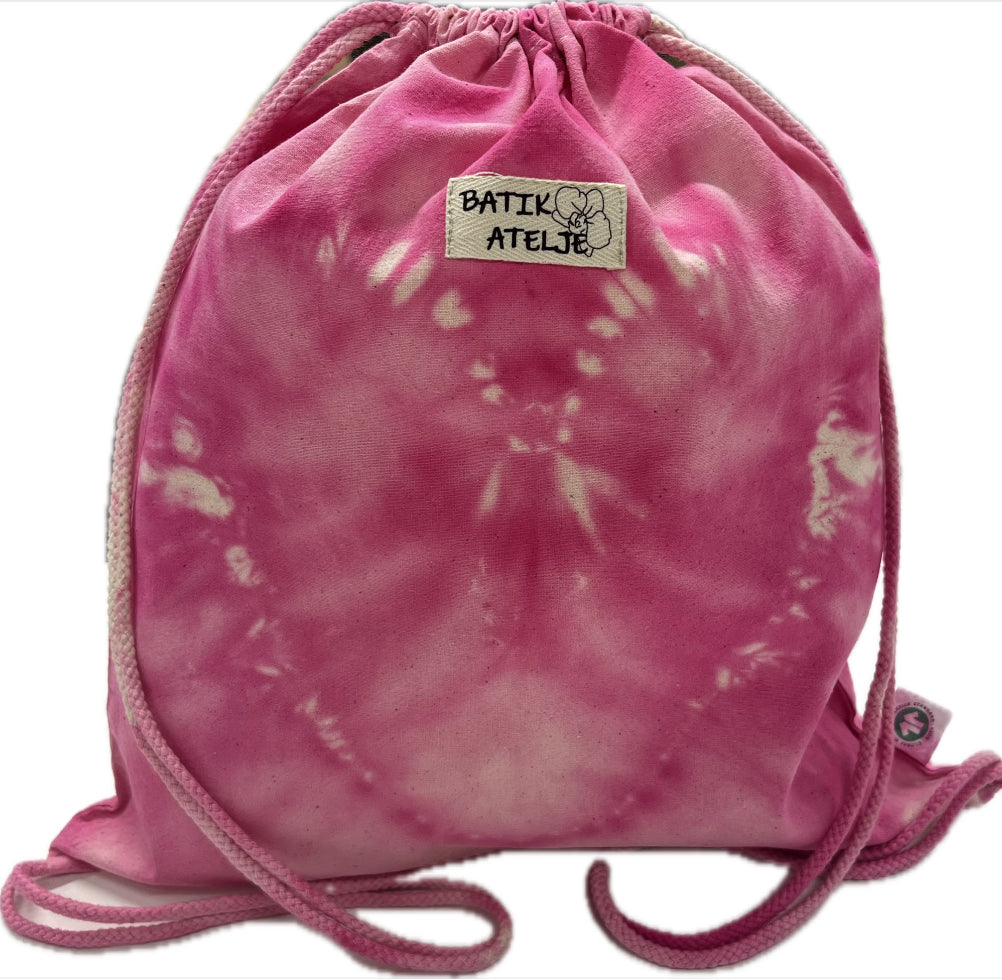 Kaunis ja kestävä fuksian punainenbatiikkikangapussi